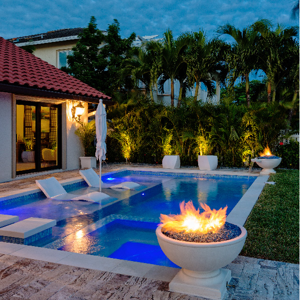 Swimming Pool With Fire Pit Oasis In, How Close Can A Fire Pit Be To Pool